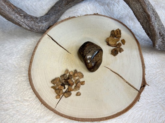 Bronziet trommelsteen